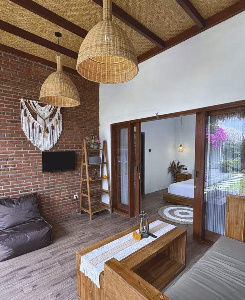 Living room with red brick and bamboo ceiling
