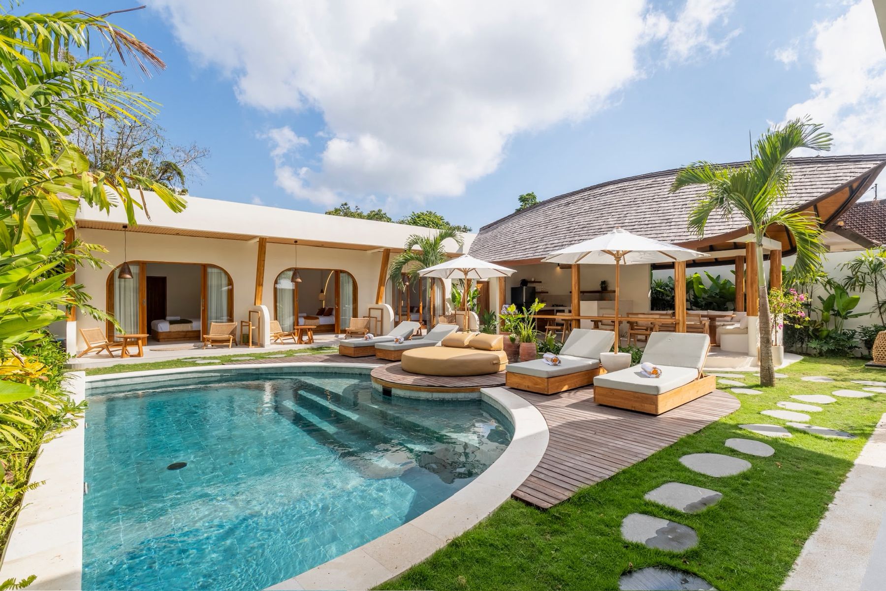 Pool, decks and tropical garden of Villa Suma