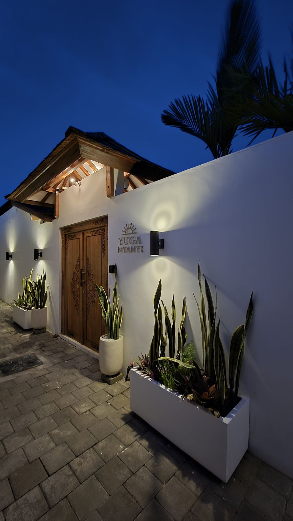Villa Yuga's entrance at nightfall